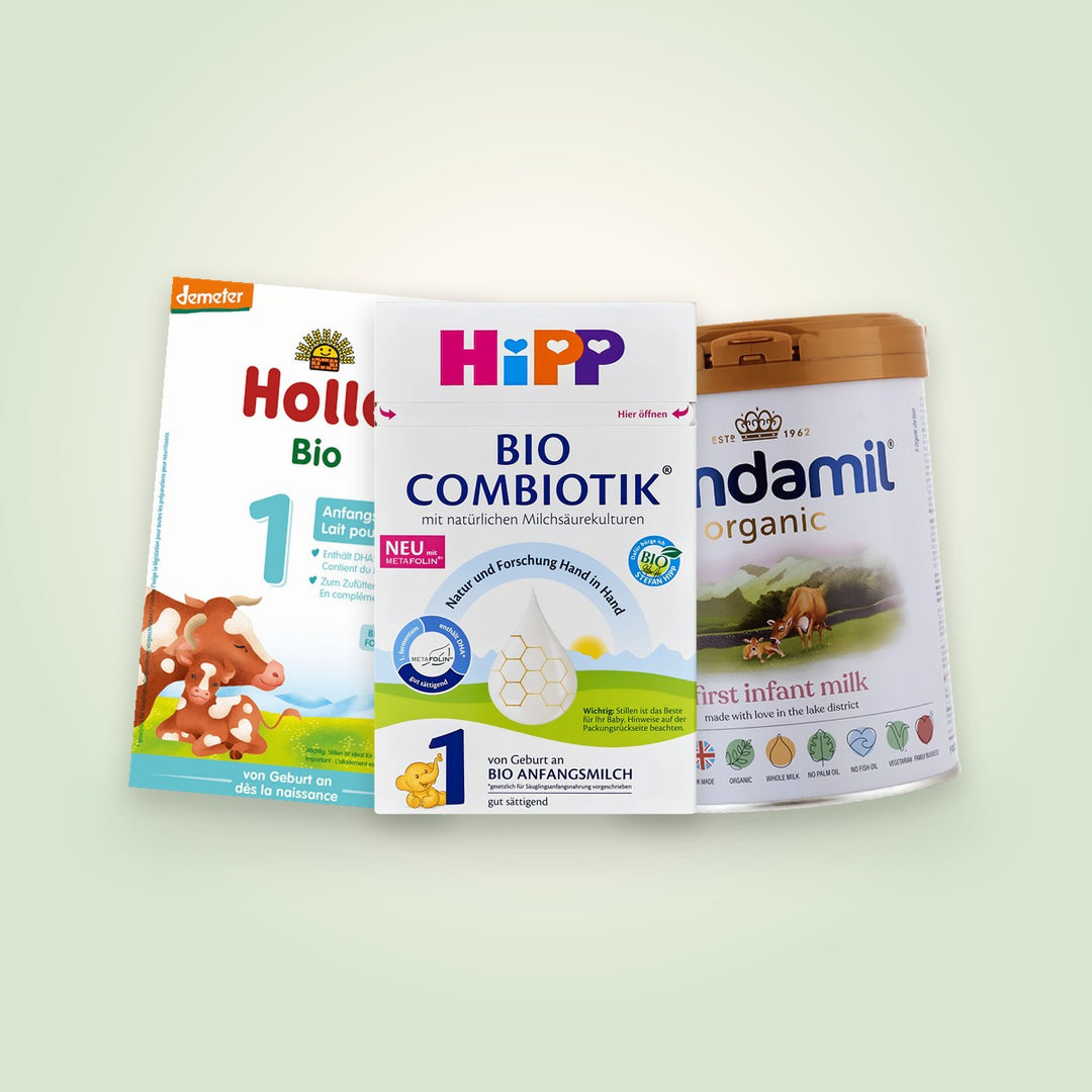 HiPP, Holle and Kendamil organic baby formula boxes and tins